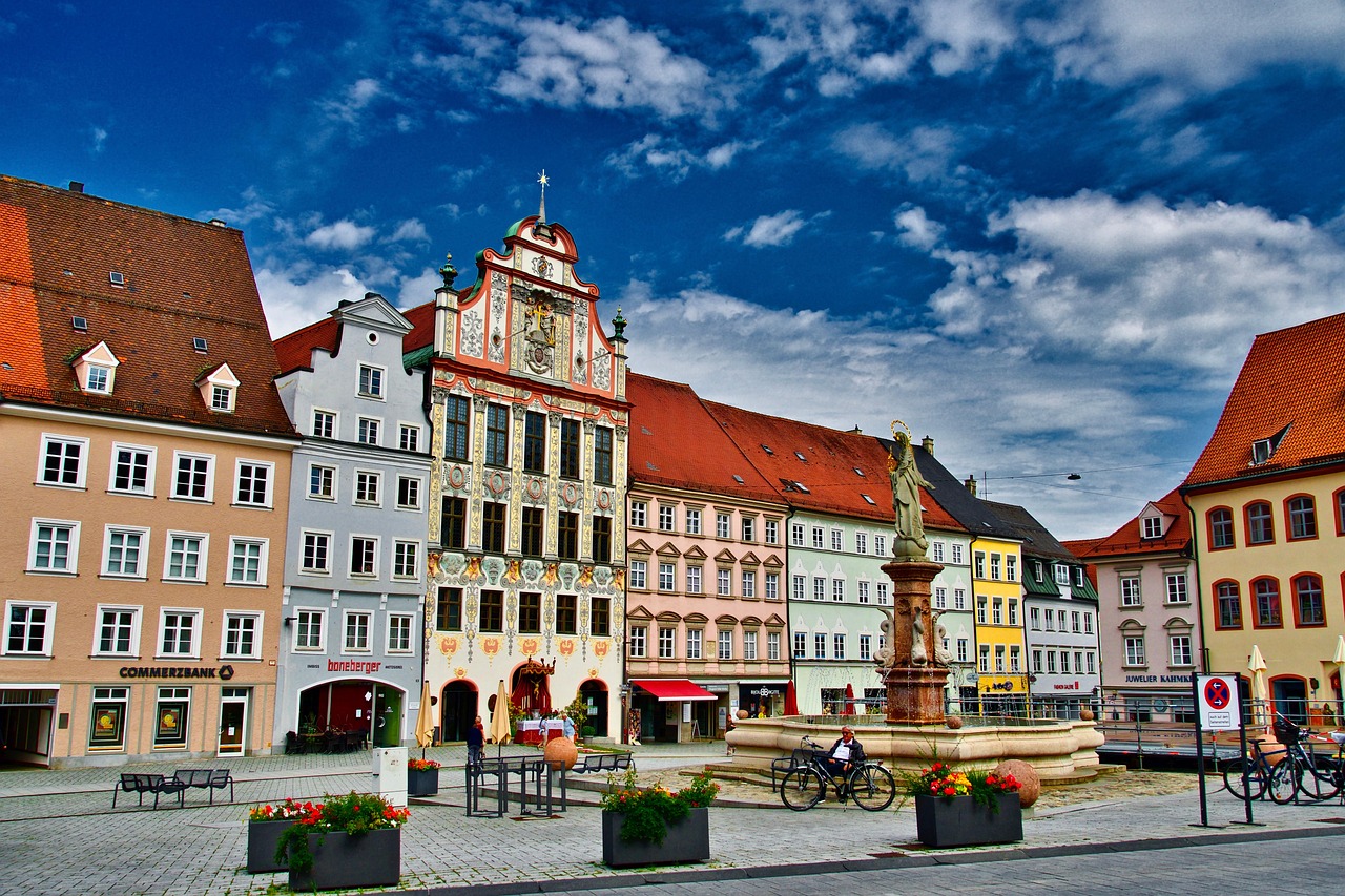 A family support session taking place around a table with community staff.